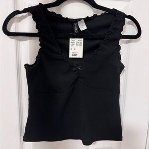 Divided Black Ruffled Blouse